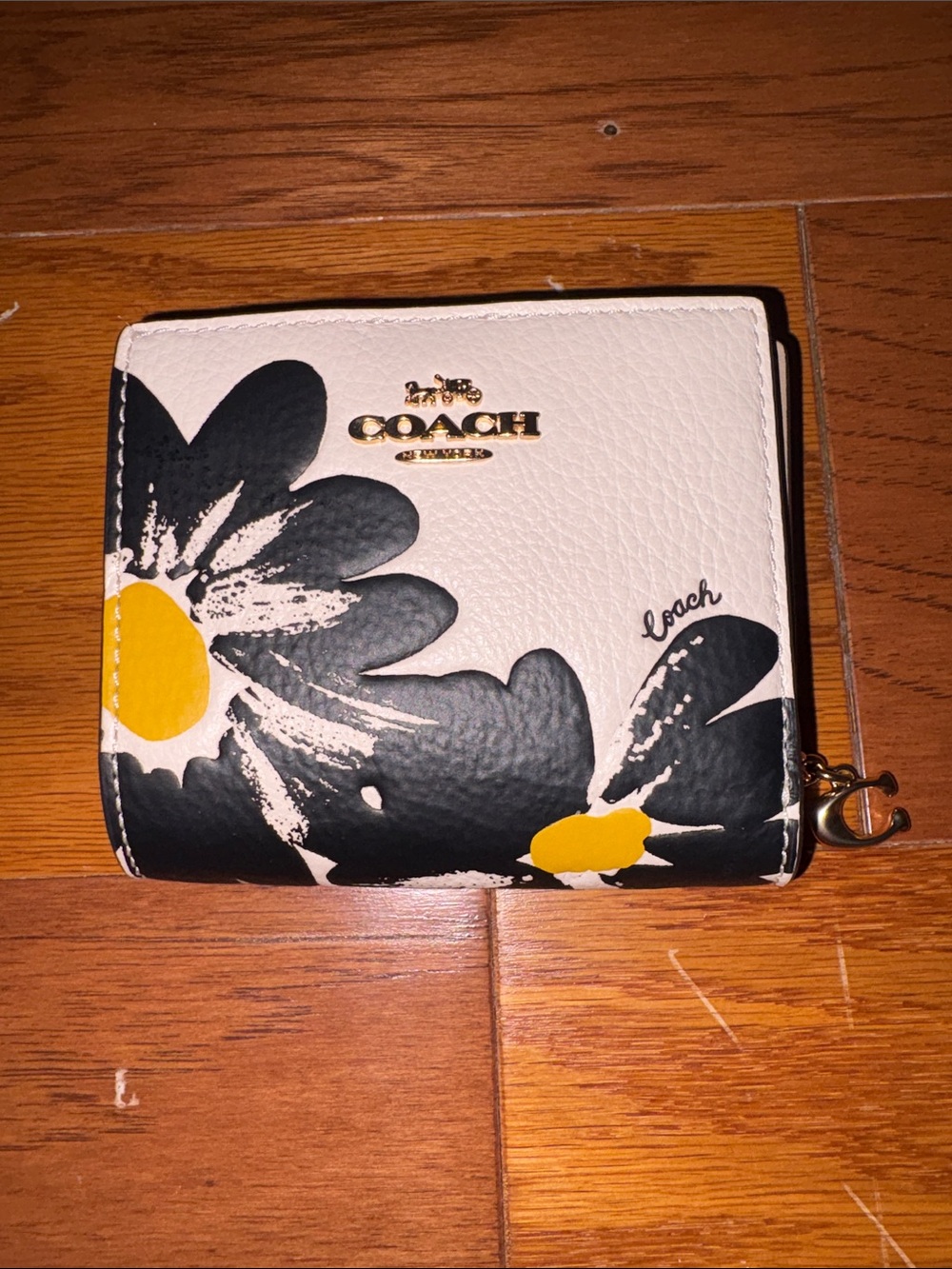 Coach White Pebbled Leather Floral Zip Wallet with Black and Yellow Accents